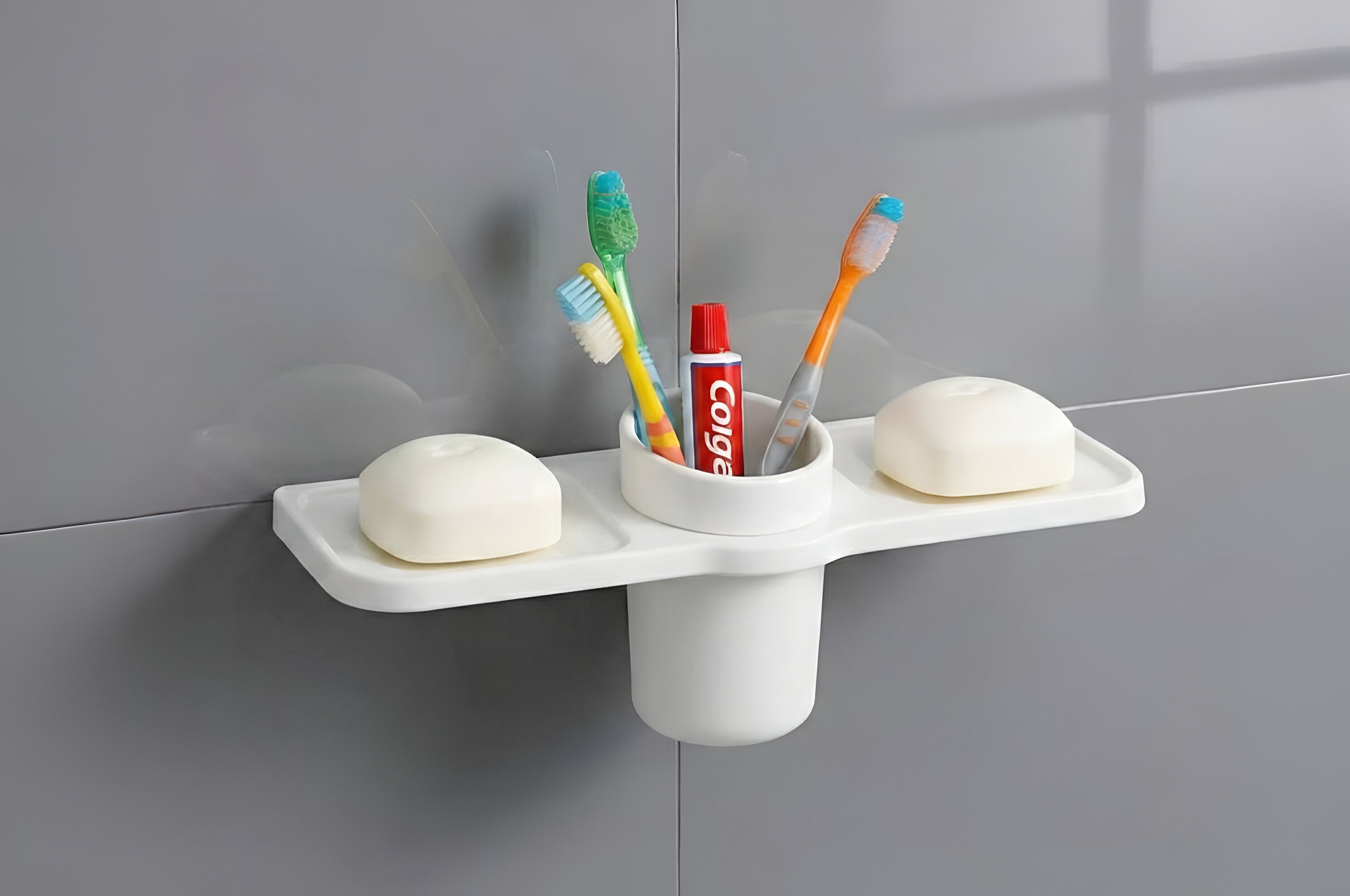 Dual soap dish with brush holder designed for bathroom organization