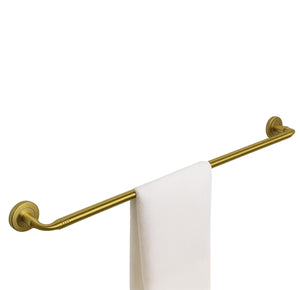 Gold towel bar with a white towel on a white background