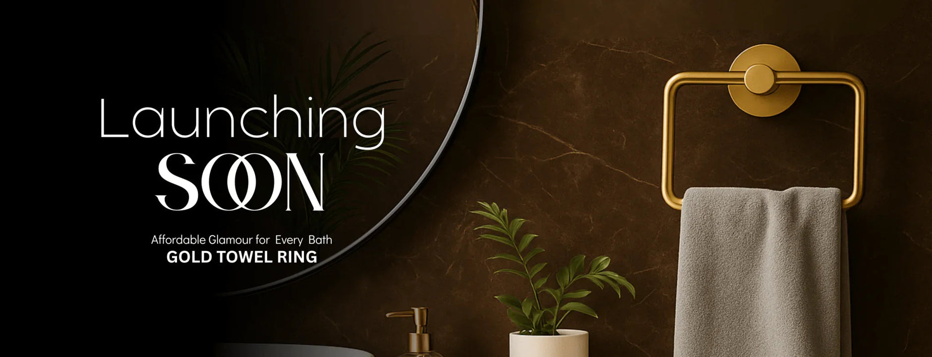 Gold towel ring with hanging grey towel in modern bathroom with dark marble wall