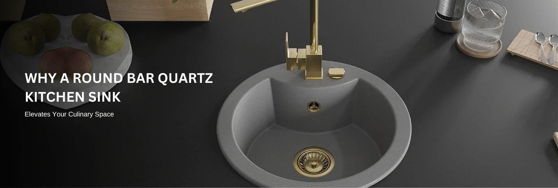 Round quartz kitchen sink with gold faucet on a black countertop, modern kitchen setup