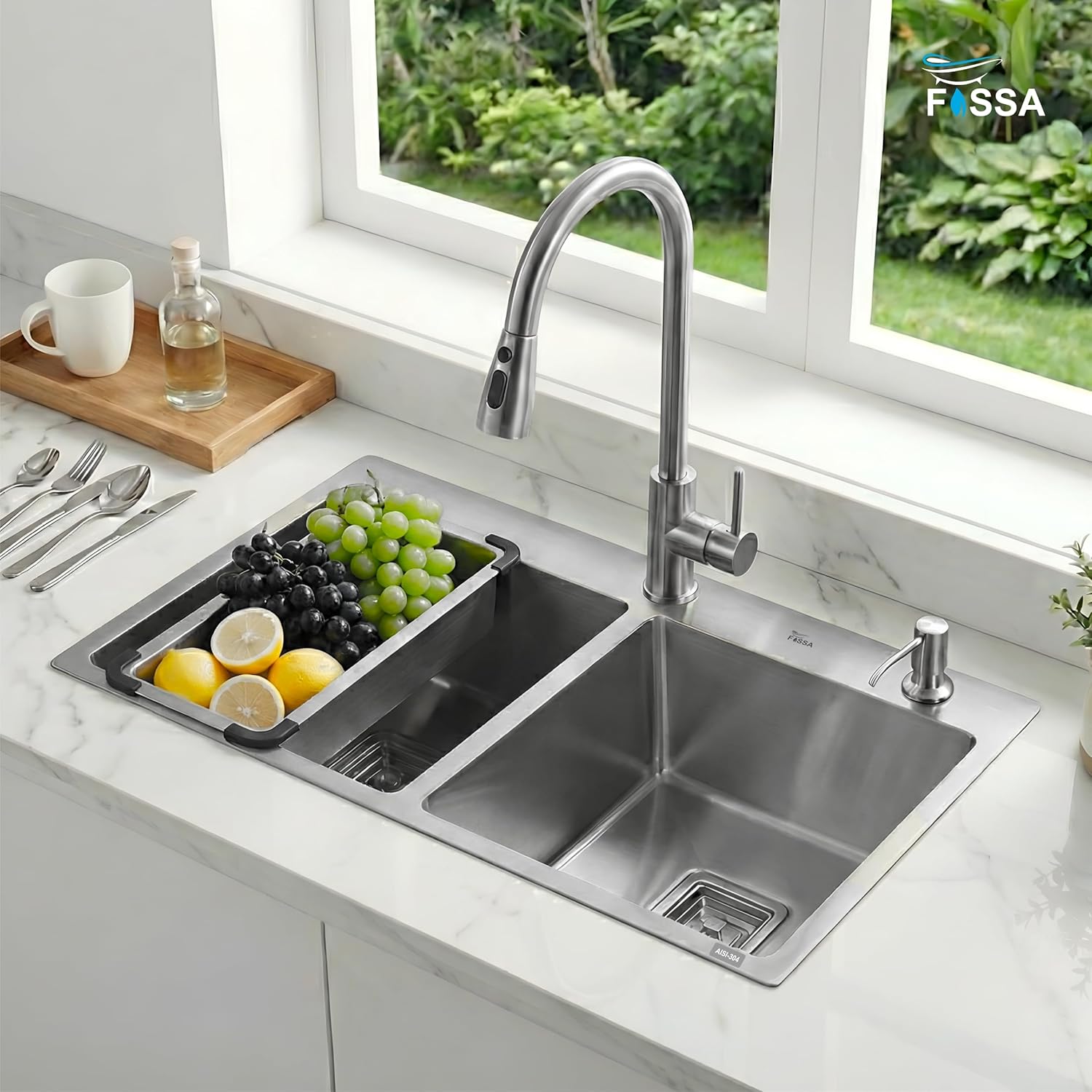 Stainless steel kitchen sink with a modern faucet in a bright kitchen setting.
