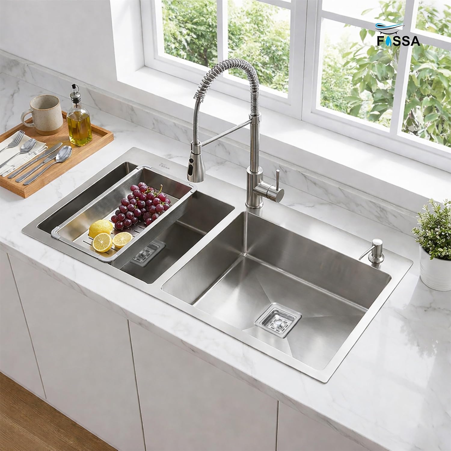 Stainless steel kitchen sink with a modern faucet in a bright kitchen setting.