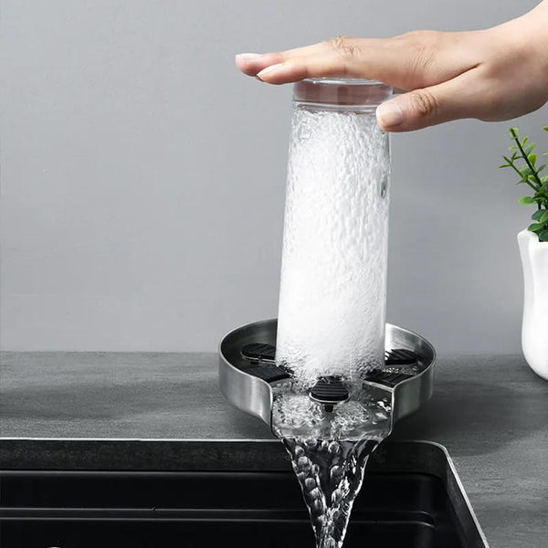 Glass rinser installed on kitchen sink for quick cup cleaning”