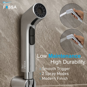 modern bathroom toilet with silver abs health faucet gun installed