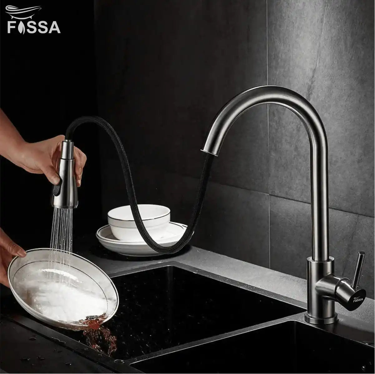 “Pull-out kitchen mixer installed on a modern kitchen sink”