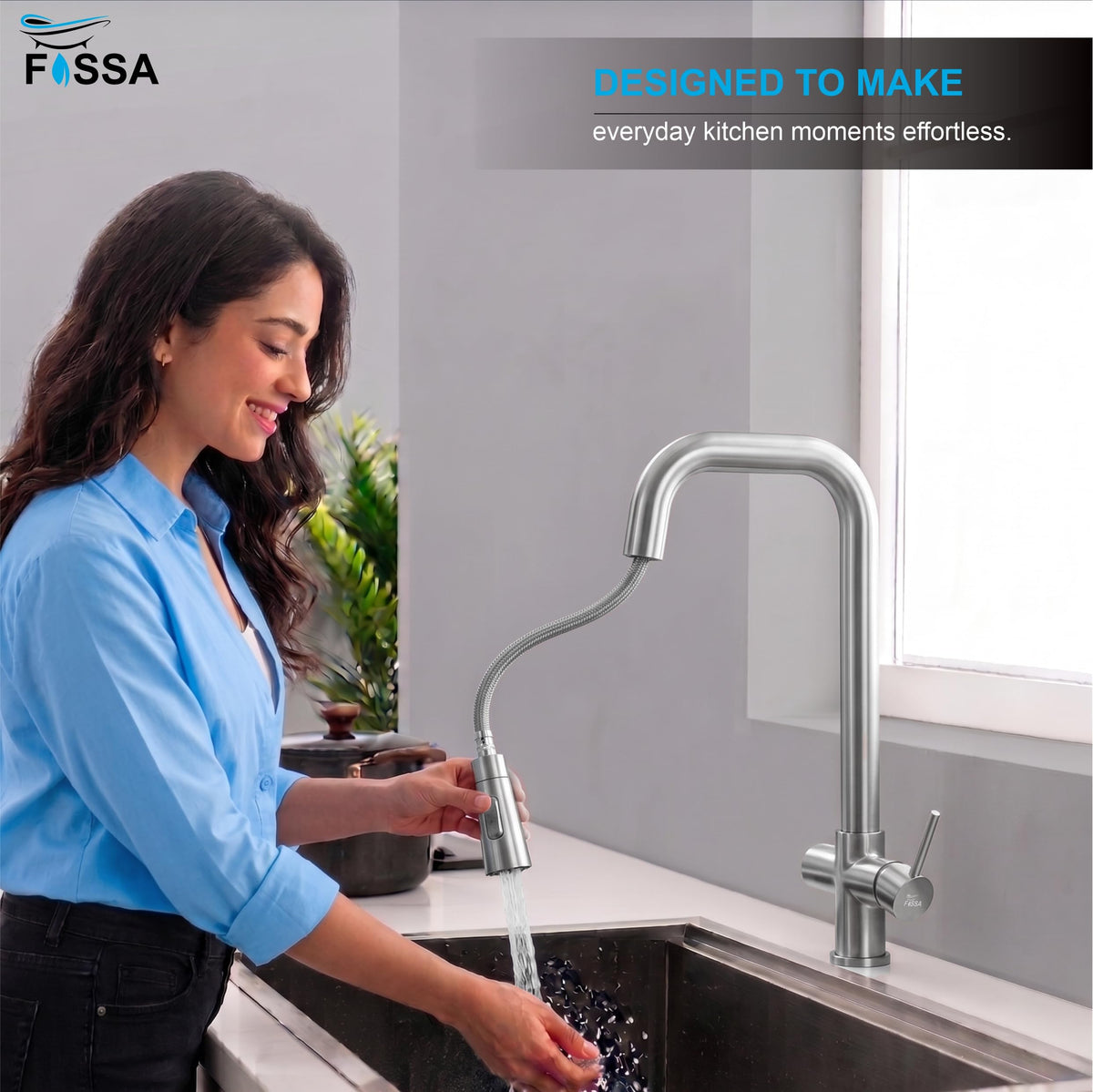 Cacia Hot and Cold Silver Kitchen Tap with heavy-duty stainless steel construction and flexible spray head
