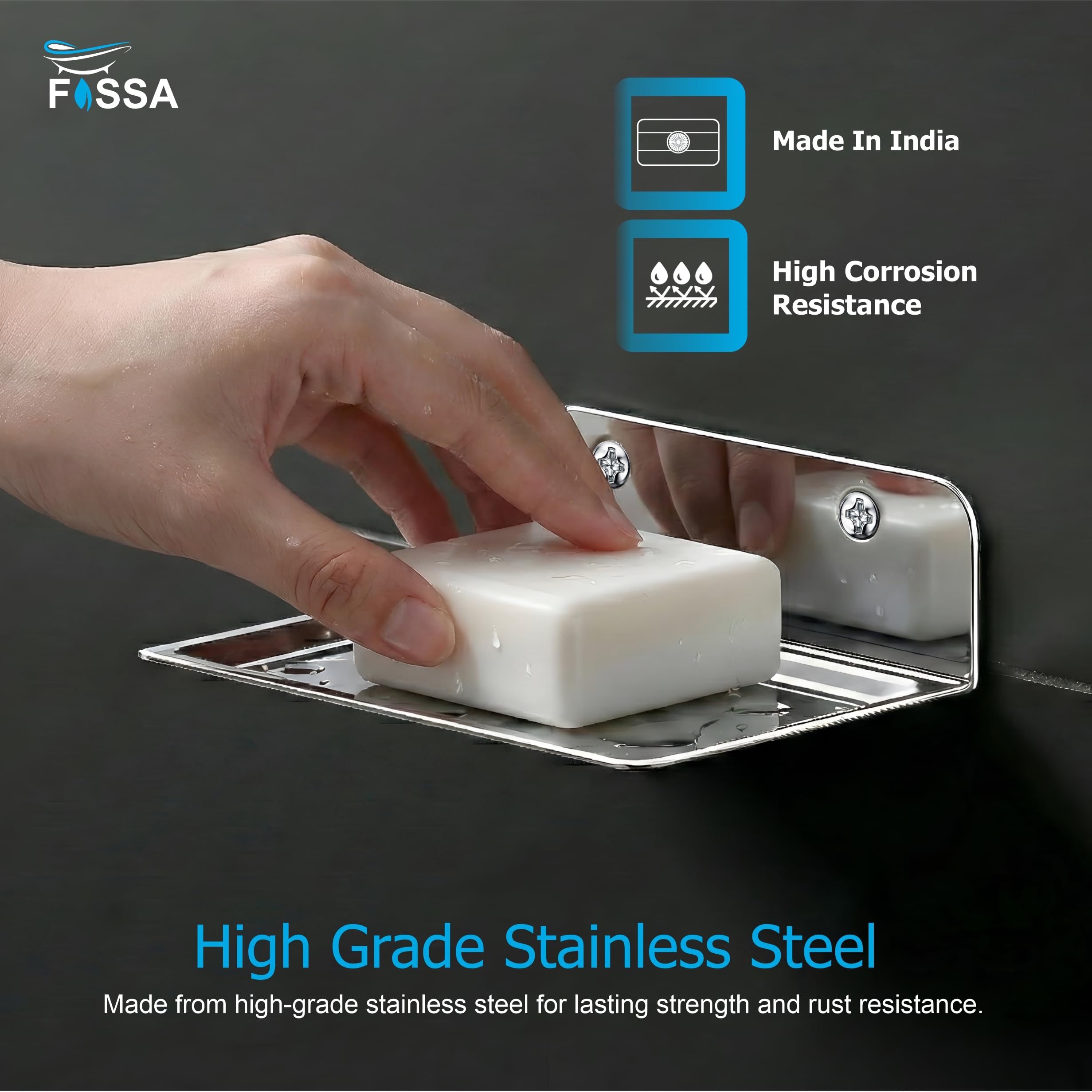 Hand using a bar of soap on a high-grade stainless steel soap dish with Fossa branding.